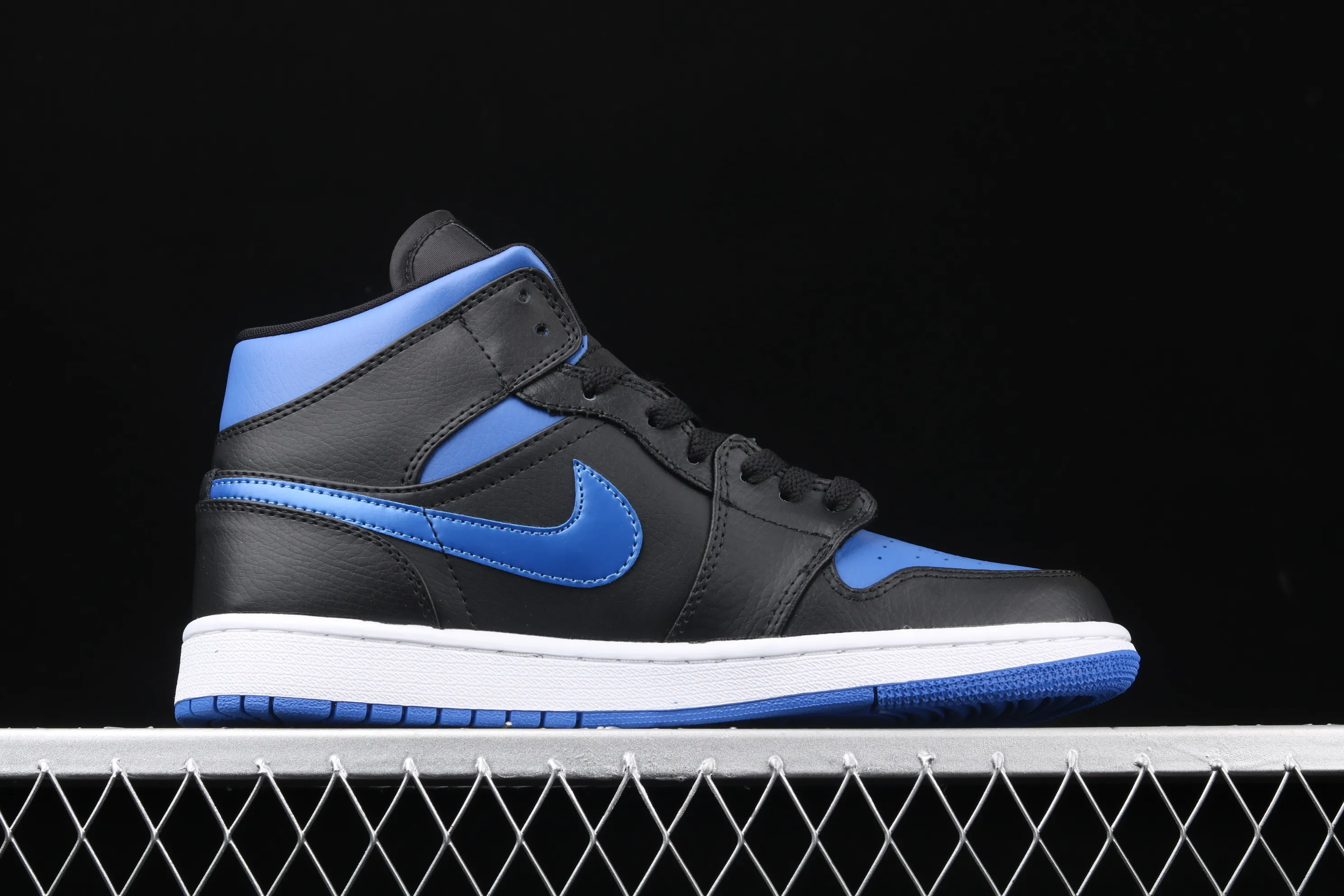 All categories Air Jordan Jordan series basketball shoes Air Jordan 1 Mid Air Jordan 1 Mid AJ1 Joe 1 mid-top black and blue basketball shoes 554724-068